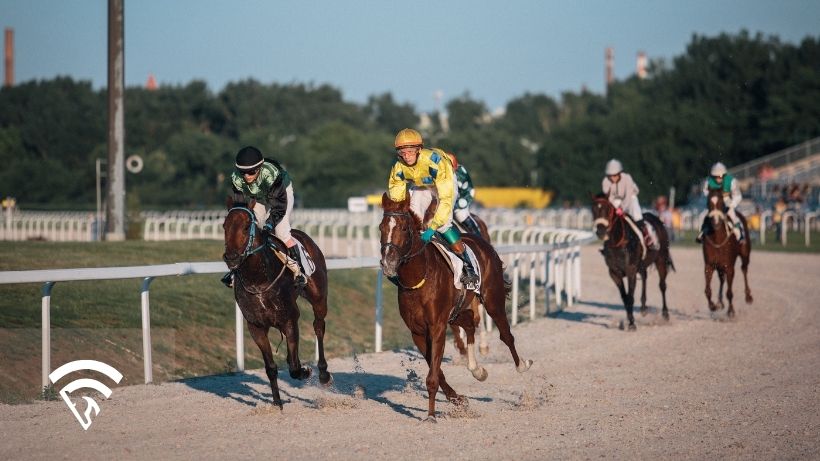 Horses racing representing the topic of a false favorite in horse racing