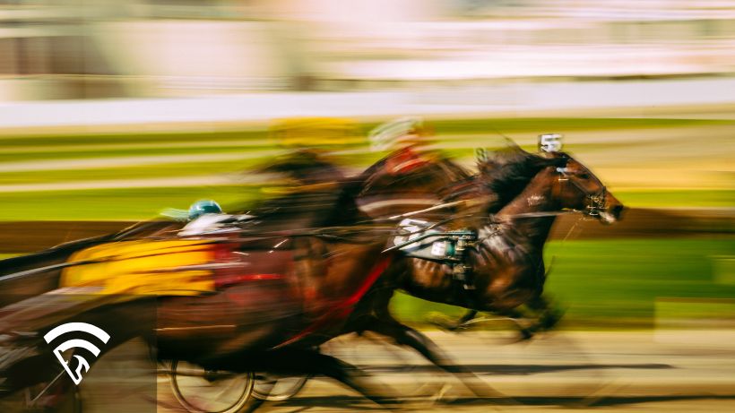 Close up of horses racing representing early speed vs. late speed