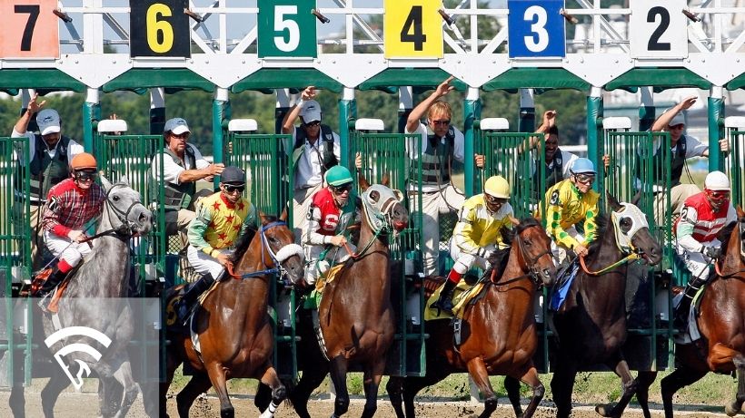 Horses racing from the gate representing the topic of a confidence interval in horse racing analysis